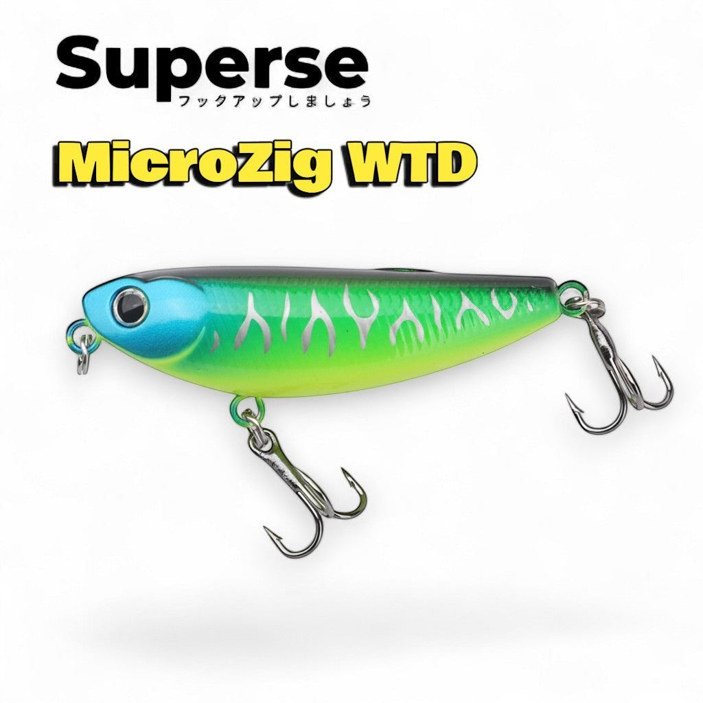 WBQ Tackle Supplies Superse MicroZig fishing lure with blue head, green body, and silver flame pattern. Features two treble hooks.
