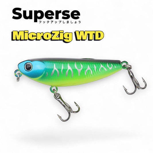 WBQ Tackle Supplies Superse MicroZig fishing lure with blue head, green body, and silver flame pattern. Features two treble hooks.