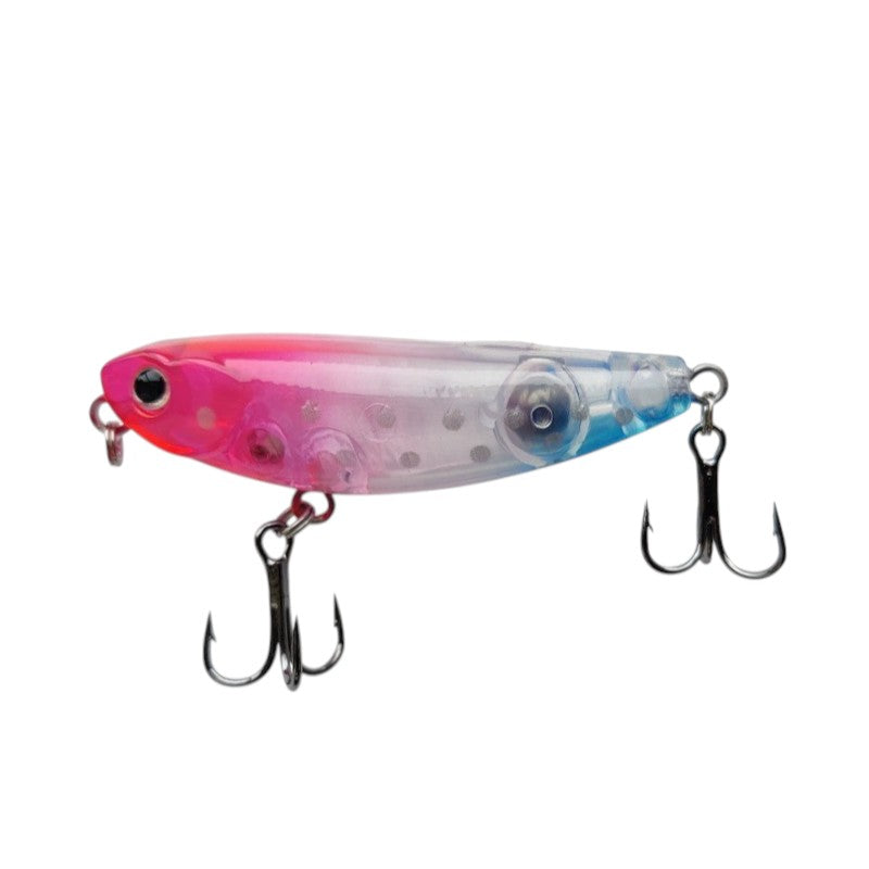 WBQ Tackle supplies Superse MicroZig fishing lure with pink and blue gradient, transparent body, and treble hooks.