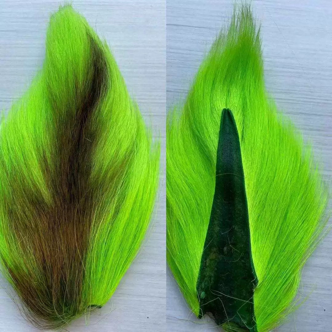 WBQ Tackle supplies bright neon green bucktail fur with brown undertones, ideal for fly tying and fishing lures.