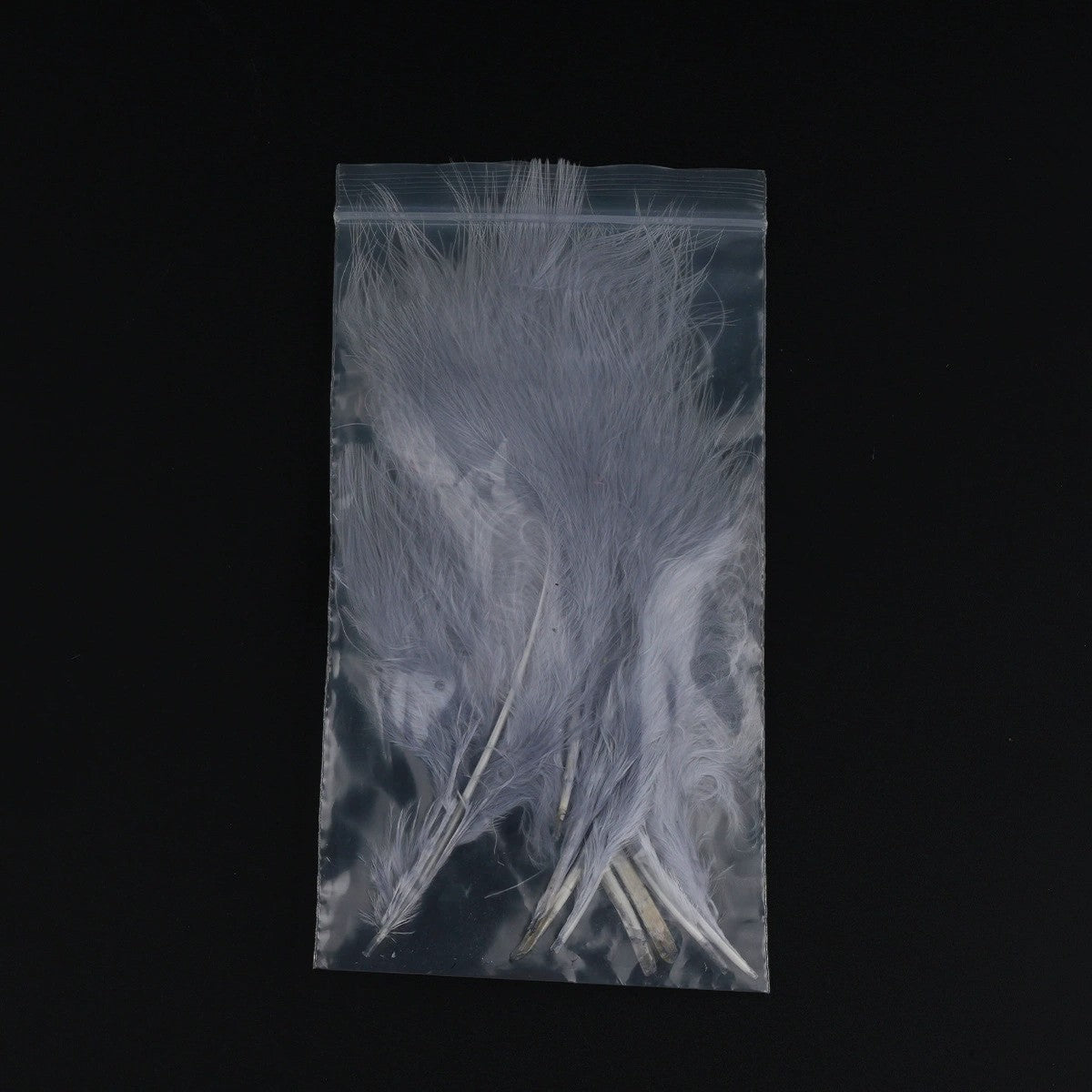 WBQ Tackle supplies light grey marabou feathers for fly tying, soft and fluffy texture.