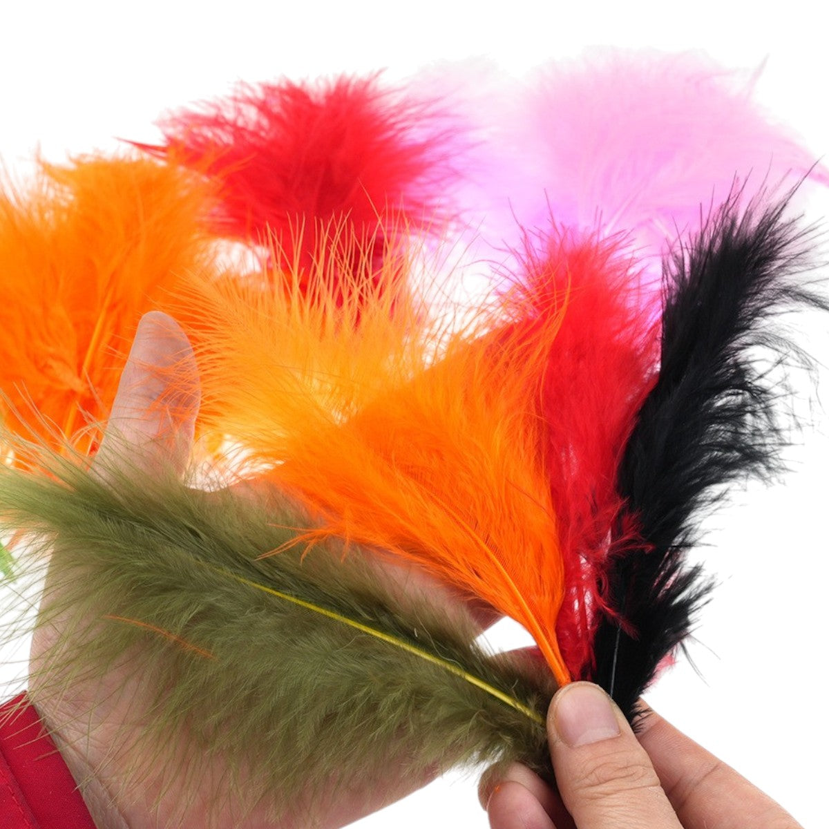 WBQ Tackle supplies Superse MARABOU fly tying feathers in assorted colors: green, orange, red, pink, and black.