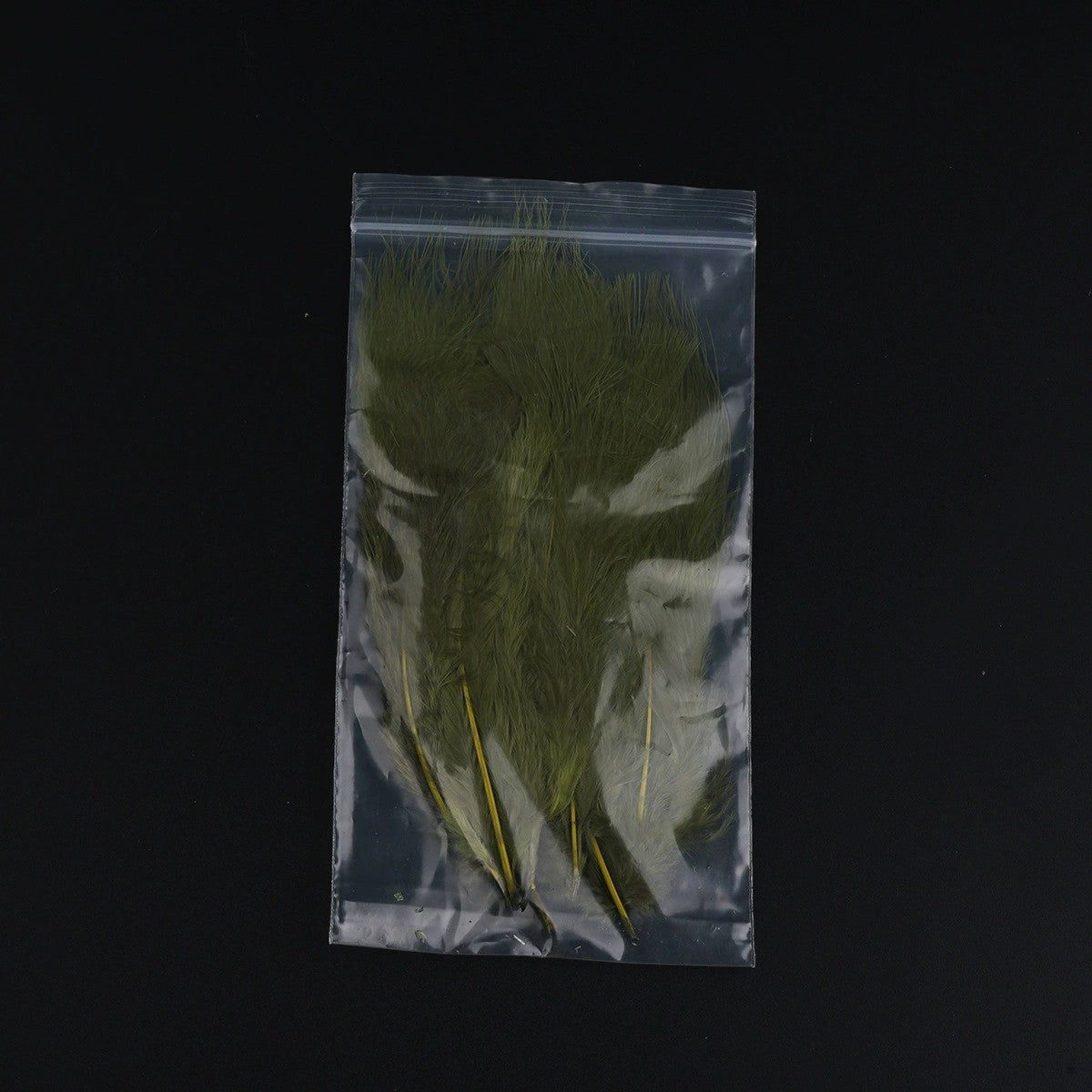 WBQ Tackle supplies Superse MARABOU fly tying feathers in olive green with yellow stems, packaged in a clear plastic bag.
