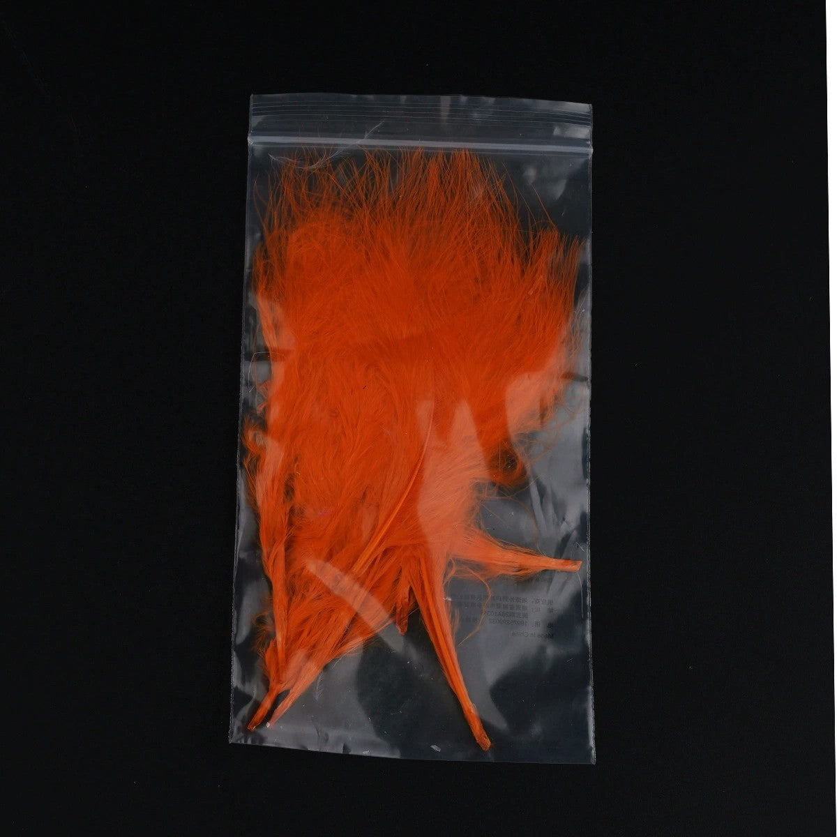 WBQ Tackle supplies Superse MARABOU orange fly tying feathers in plastic packaging